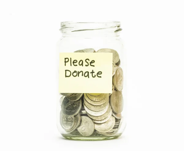 Isolated coins in jar with please donate label — Stock Photo, Image