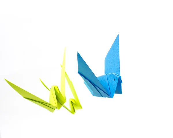 Origami birds flying on white background — Stock Photo, Image