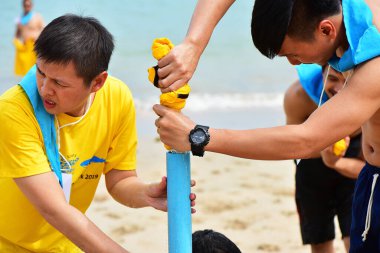 ChonBuri Tayland 1 Ağustos 2019 Japon şirketi çalışanlarını 2019 Plaj Ekibi Mükemmellik Ekibi 'nin faaliyetlerine götürüyor.