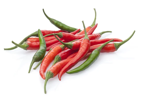 Group chili peppers isolated on a white — Stock Photo, Image