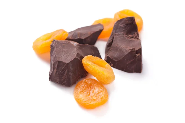 Chokolate and dried apricots — Stock Photo, Image