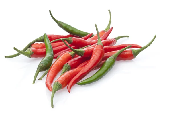 Group chili peppers isolated on a white Stock Picture