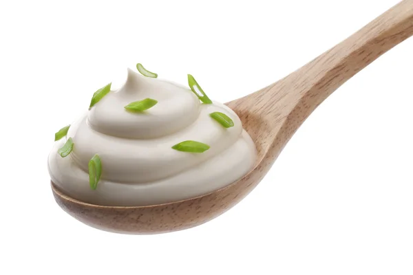 Cream in spoon isolated — Stock Photo, Image