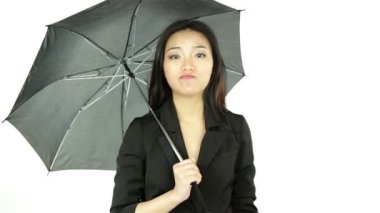 bir şemsiye ile iş kadını