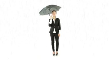 bir şemsiye ile iş kadını