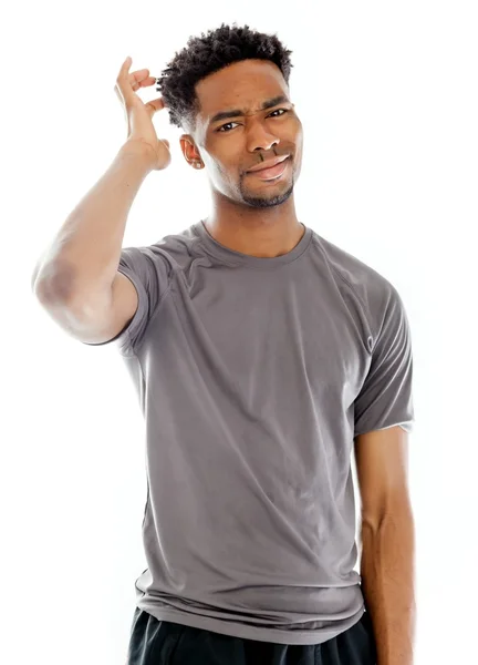 Atractivo hombre afroamericano posando en estudio —  Fotos de Stock