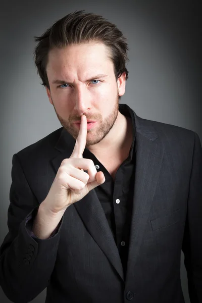 Attractive caucasian man posing in studio — Stock Photo, Image