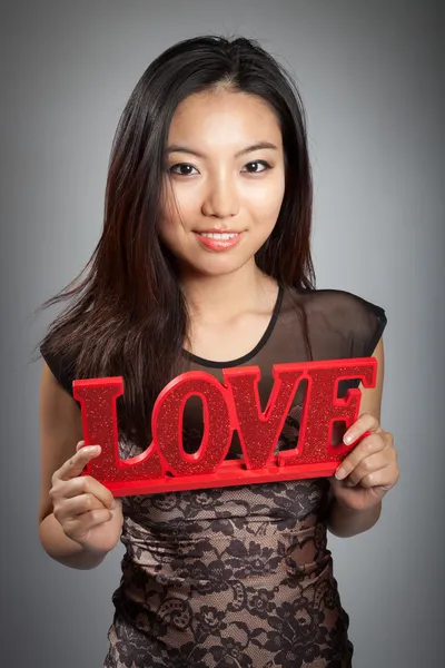 Attractive asian girl posing in studio — Stock Photo, Image