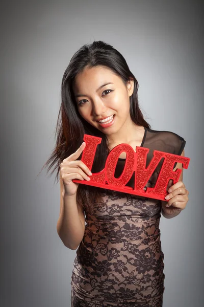 Attractive asian girl posing in studio — Stock Photo, Image