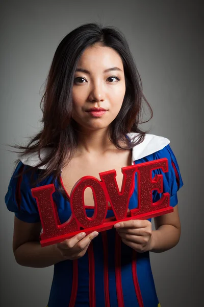 Attractive asian girl posing in studio — Stock Photo, Image