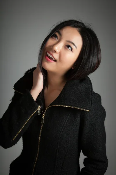 Attractive asian girl posing in studio — Stock Photo, Image