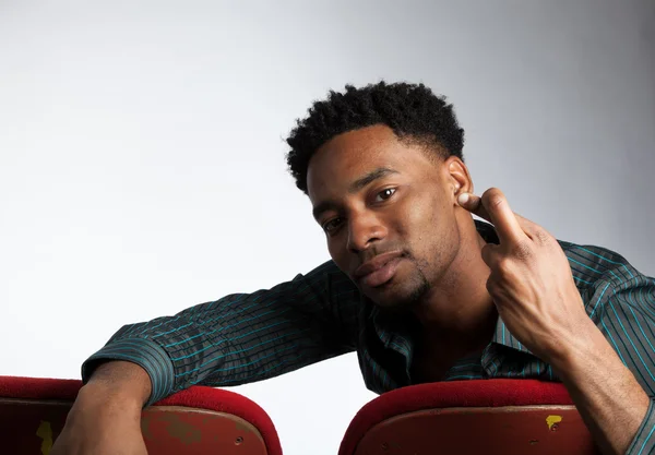 Attractive afro-american man posing in studio — Stock Photo, Image