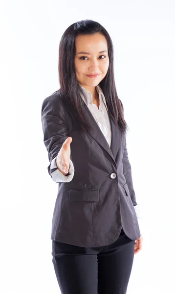 Menina asiática atraente posando no fundo branco — Fotografia de Stock