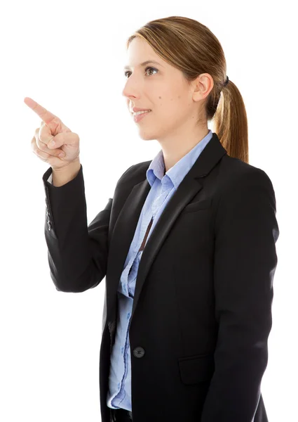 Attractive caucasian businesswoman points with a finger — Stock Photo, Image