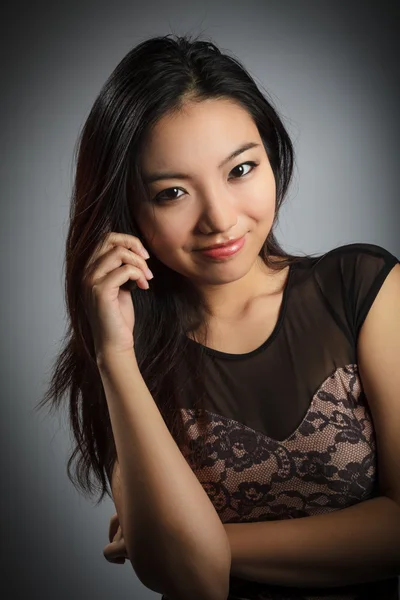 Attractive asian girl 20 years old shot in studio — Stock Photo, Image