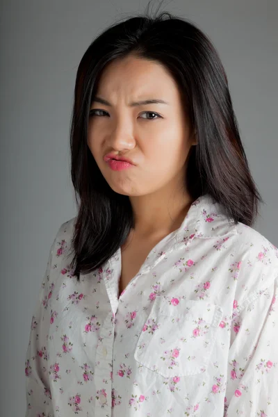 Attractive asian girl posing in studio — Stock Photo, Image