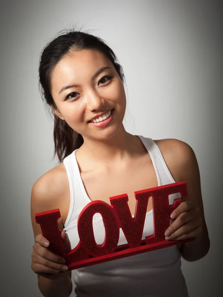 Attractive asian girl posing in studio — Stock Photo, Image