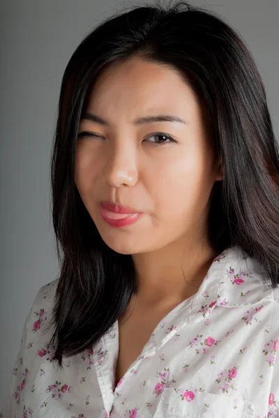 Attractive asian girl posing in studio — Stock Photo, Image