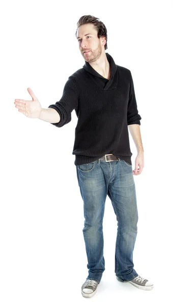 Attractive caucasian man extends his hand to greet — Stock Photo, Image