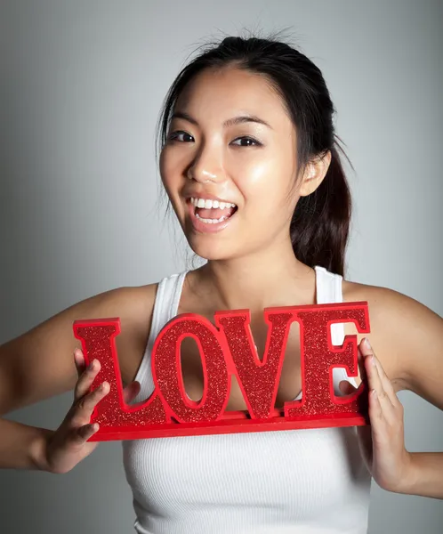 Attractive asian girl posing in studio — Stock Photo, Image