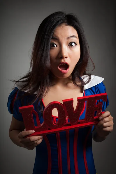 Attractive asian girl posing in studio — Stock Photo, Image