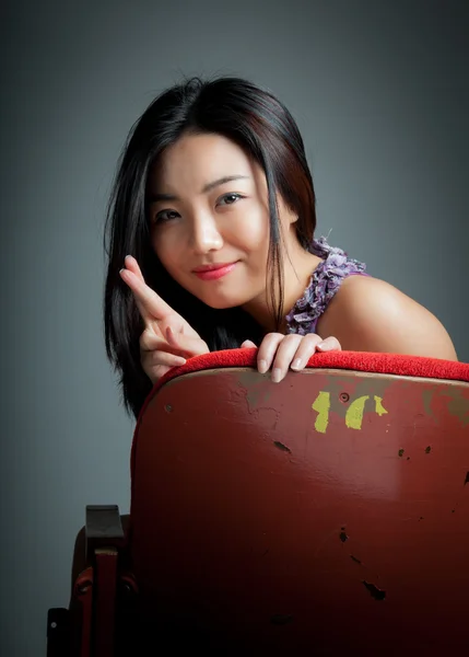 Attractive asian girl posing in studio — Stock Photo, Image