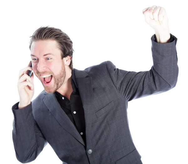 Attractive caucasian businessman heard the great news on the phone — Stock Photo, Image