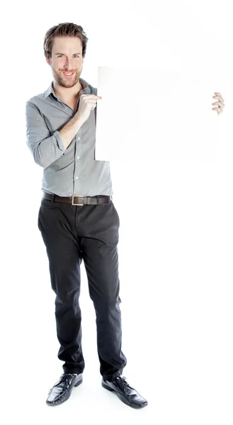 Atractivo empresario caucásico sosteniendo una hoja blanca de papel — Foto de Stock