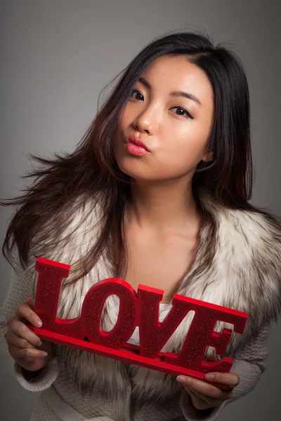 Attractive asian girl posing in studio — Stock Photo, Image