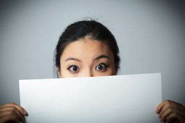 boş sayfa tutan çekici Asyalı kız