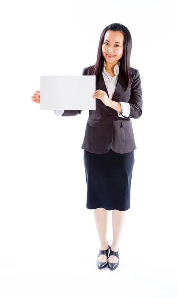 Business woman holding blank sheet of paper — Stock Photo, Image