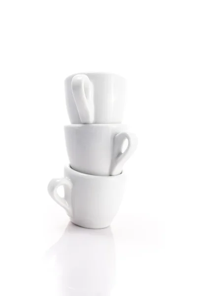 Stack of espresso cups isolated on a white background — Stock Photo, Image