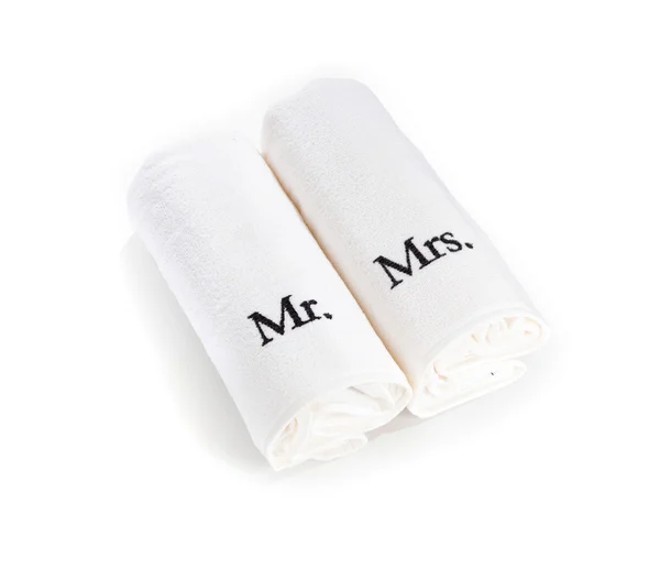 El Sr. y la Sra. enrollaron toallas blancas aisladas sobre un fondo blanco — Foto de Stock