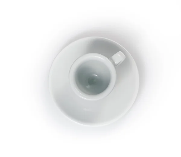 Prázdné espresso cup v talířek izolovaných na bílém pozadí — Stock fotografie