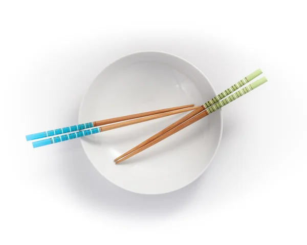 Chopsticks em tigela vazia — Fotografia de Stock