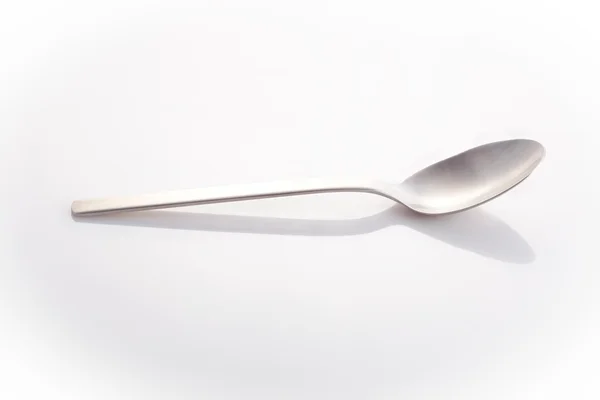 Empty silver spoon — Stock Photo, Image