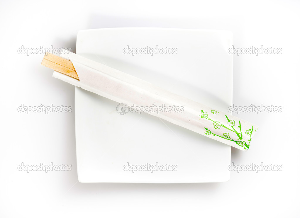 Disposable chopsticks on a plate