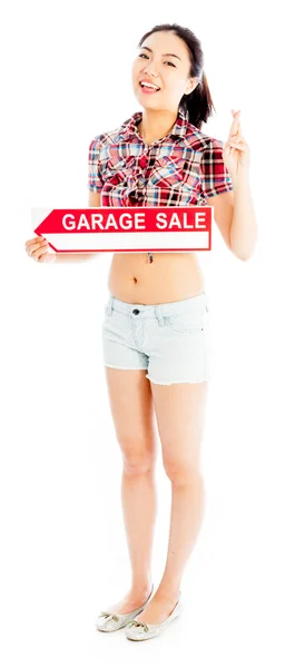 Geïsoleerd op witte sexy Aziatische veedrijfster garageverkoop — Stockfoto