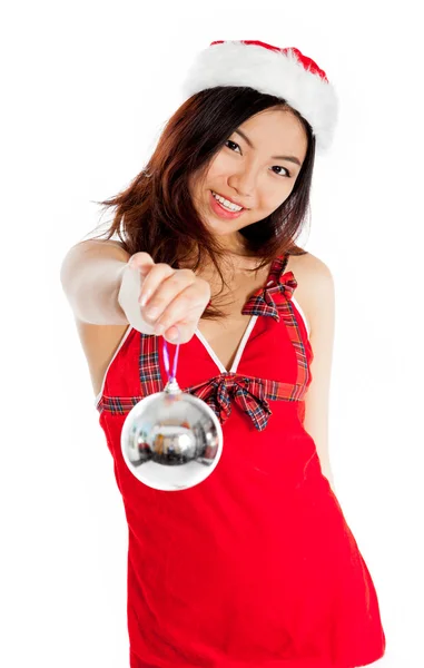 Sexy asian santa claus giving a christmas decoration — Stock Photo, Image