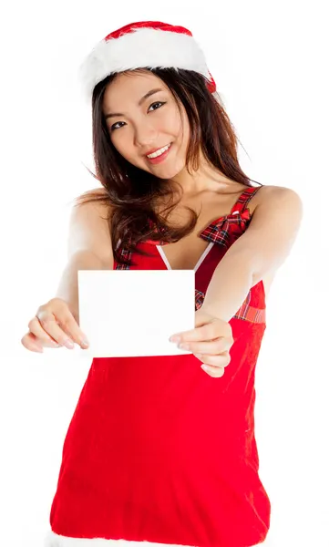 Sexy asian santa claus holding a blank business card — Stock Photo, Image