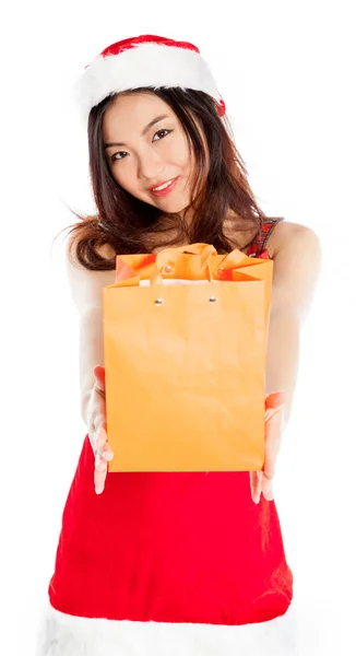 Sexy asian santa claus giving a gift — Stock Photo, Image