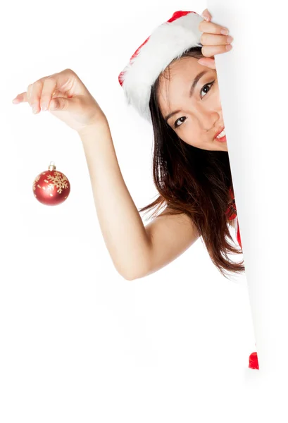 Edge of the page Sexy asian santa claus holding decoration — Stock Photo, Image