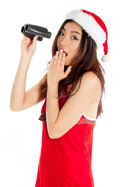 性感亚洲圣诞老人惊讶用双筒望远镜 — 图库照片