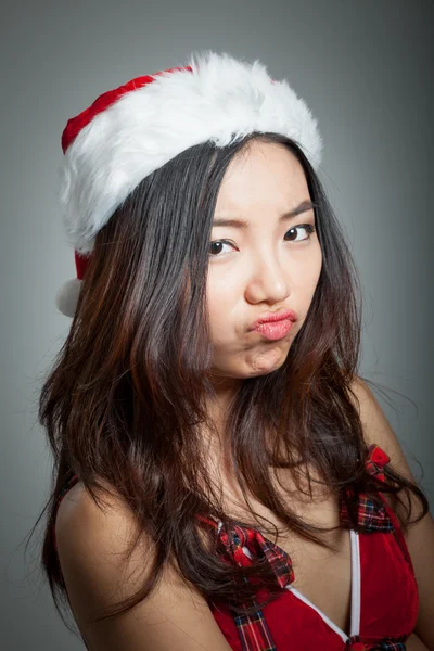 Sexy asian santa claus on grey backgroound upset — Stock Photo, Image