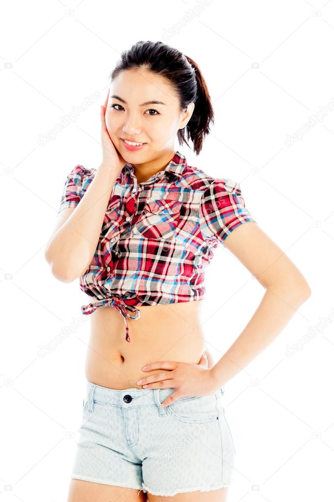 Isolated on white sexy asian cowgirl confused