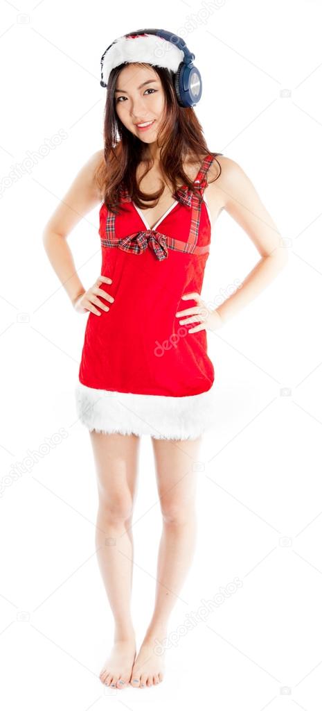Sexy asian santa claus listening to music