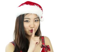 dudaklarında parmak ile cazip Asya Noel Baba kız