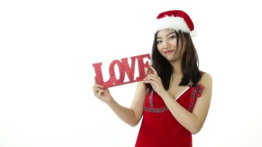 sevgi işareti ile cazip Asya Noel Baba kız