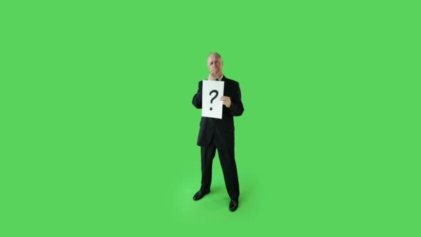 Senior businessman with question sign — Stock Video
