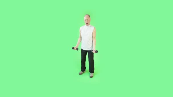 Senior sportsman exercising with dumbbell — Stock Video